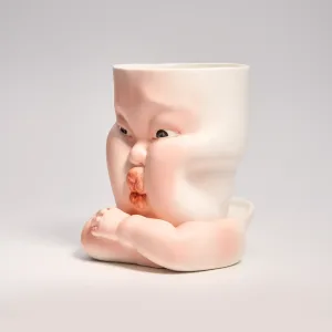 Whimsical Ceramic Cheeky Pinch Mug-this hand-painted mug features a chubby cheek being pinched in a gesture of affection