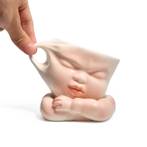 Whimsical Ceramic Cheeky Pull Mug-this hand-painted mug captures a playful moment with the mouth corner being pulled