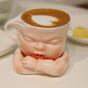 Whimsical Ceramic Cheeky Pull Mug-this hand-painted mug captures a playful moment with the mouth corner being pulled