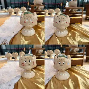 Jester's Many Faces Fragrance Holder-this handmade fragrance holder features four faces depicting joy, anger, sorrow, and happiness