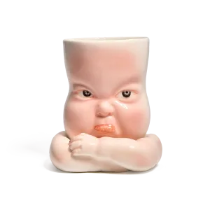 Whimsical Ceramic Pouty Mug-this hand-painted mug features a quirky pouting expression with twisted lips