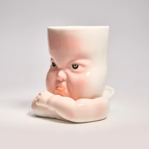Whimsical Ceramic Pouty Mug-this hand-painted mug features a quirky pouting expression with twisted lips