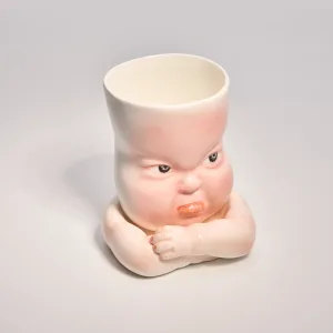Whimsical Ceramic Pouty Mug-this hand-painted mug features a quirky pouting expression with twisted lips