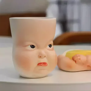 Whimsical Ceramic Pouty Mug-this hand-painted mug features a quirky pouting expression with twisted lips