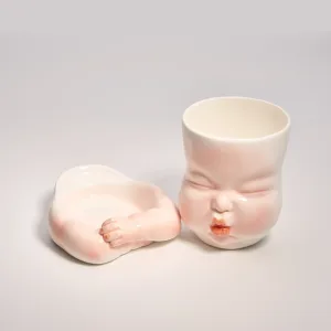 Whimsical Ceramic Smooch Mug-this hand-painted mug features a cute puckered face ready for a shy kiss.