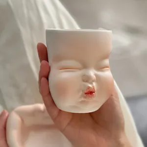 Whimsical Ceramic Smooch Mug-this hand-painted mug features a cute puckered face ready for a shy kiss.