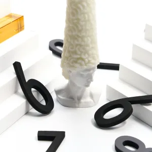 Bald David Bust Scented Candle–The scented candle's wax 'hair' slowly melts away as it burns