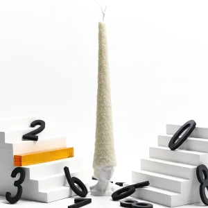 Bald David Bust Scented Candle–The scented candle's wax 'hair' slowly melts away as it burns