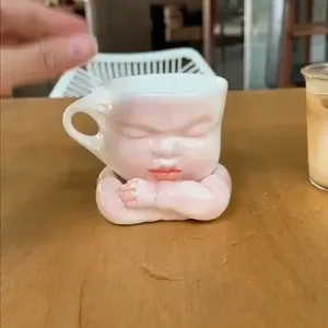 Whimsical Ceramic Cheeky Pull Mug-this hand-painted mug captures a playful moment with the mouth corner being pulled