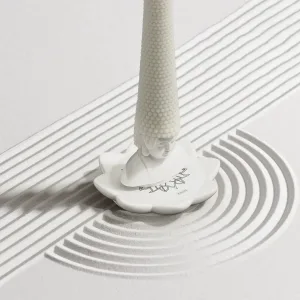 Whimsical Buddha Head Scented Candle-Featuring an exaggerated wax "hair" that extends from a joyful Buddha base.