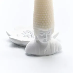 Whimsical Buddha Head Scented Candle-Featuring an exaggerated wax "hair" that extends from a joyful Buddha base.