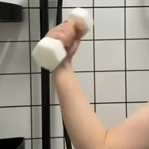 Dumbbell Soap-wash your body and "train" your biceps at the same time.