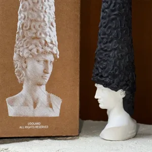 Bald David Bust Scented Candle–The scented candle's wax 'hair' slowly melts away as it burns