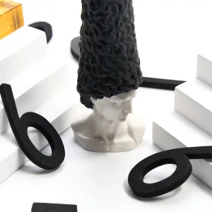 Bald David Bust Scented Candle–The scented candle's wax 'hair' slowly melts away as it burns