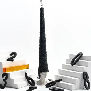 Bald David Bust Scented Candle–The scented candle's wax 'hair' slowly melts away as it burns