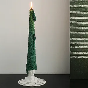 Bald David Bust Scented Candle–The scented candle's wax 'hair' slowly melts away as it burns