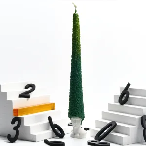 Bald David Bust Scented Candle–The scented candle's wax 'hair' slowly melts away as it burns