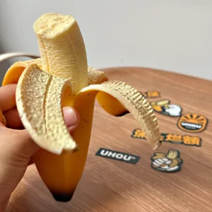 Banana Stress Toy-A hyper-realistic, half-eaten banana made of high-quality TPR.