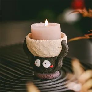 Ceramic Soot Sprite Candle Holder-Handcrafted from coarse pottery to capture the texture of a hardworking spirit.