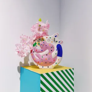 Hugging Cats Vase-A playful ceramic vase featuring two hugging cats covered in colorful doodles