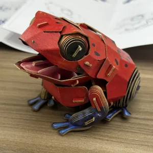 Strawberry Poison Dart Frog Paper Model-Bring the rainforest to your desk by assembling this vibrant, lifelike frog from 127 pieces of eco-friendly kraft paper