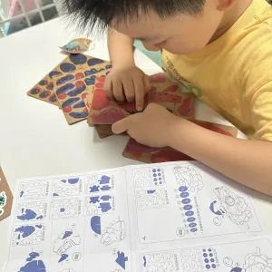 Strawberry Poison Dart Frog Paper Model-Bring the rainforest to your desk by assembling this vibrant, lifelike frog from 127 pieces of eco-friendly kraft paper