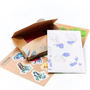 Strawberry Poison Dart Frog Paper Model-Bring the rainforest to your desk by assembling this vibrant, lifelike frog from 127 pieces of eco-friendly kraft paper
