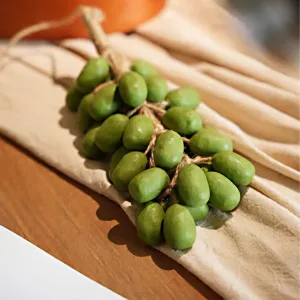 Realistic Grape Cluster Hand Soap-This realistic soap cluster turns hand-washing into a playful harvesting ritual.