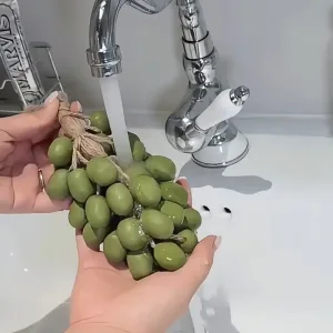 Realistic Grape Cluster Hand Soap-This realistic soap cluster turns hand-washing into a playful harvesting ritual.