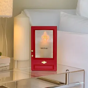 Cinematic red door Candle Holder-Inspired by The Odyssey, this red gate features a textured optical lens that transforms candlelight into a dreamy, cinematic ripple.